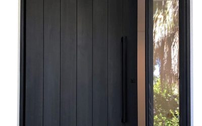 How a Natural Wood Front Door Softens Modern Home Exteriors